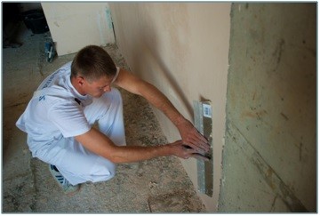 Фото 11. Глянцювання штукатурного шару